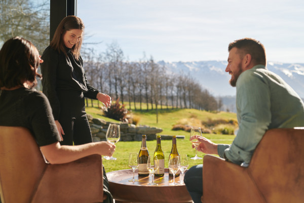 Couple enjoying wine at Cloudy Bay cellar doors
