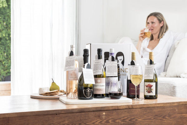 woman enjoying a glass of wine