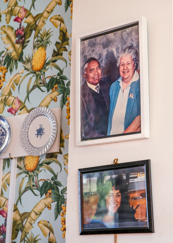 The family photograph-covered walls at Blue Rose Café.