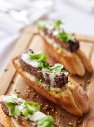 Tunisian Inspired Lamb Ribs, Tahini Yoghurt, Macadamia Dukkah, White Bean Hummus