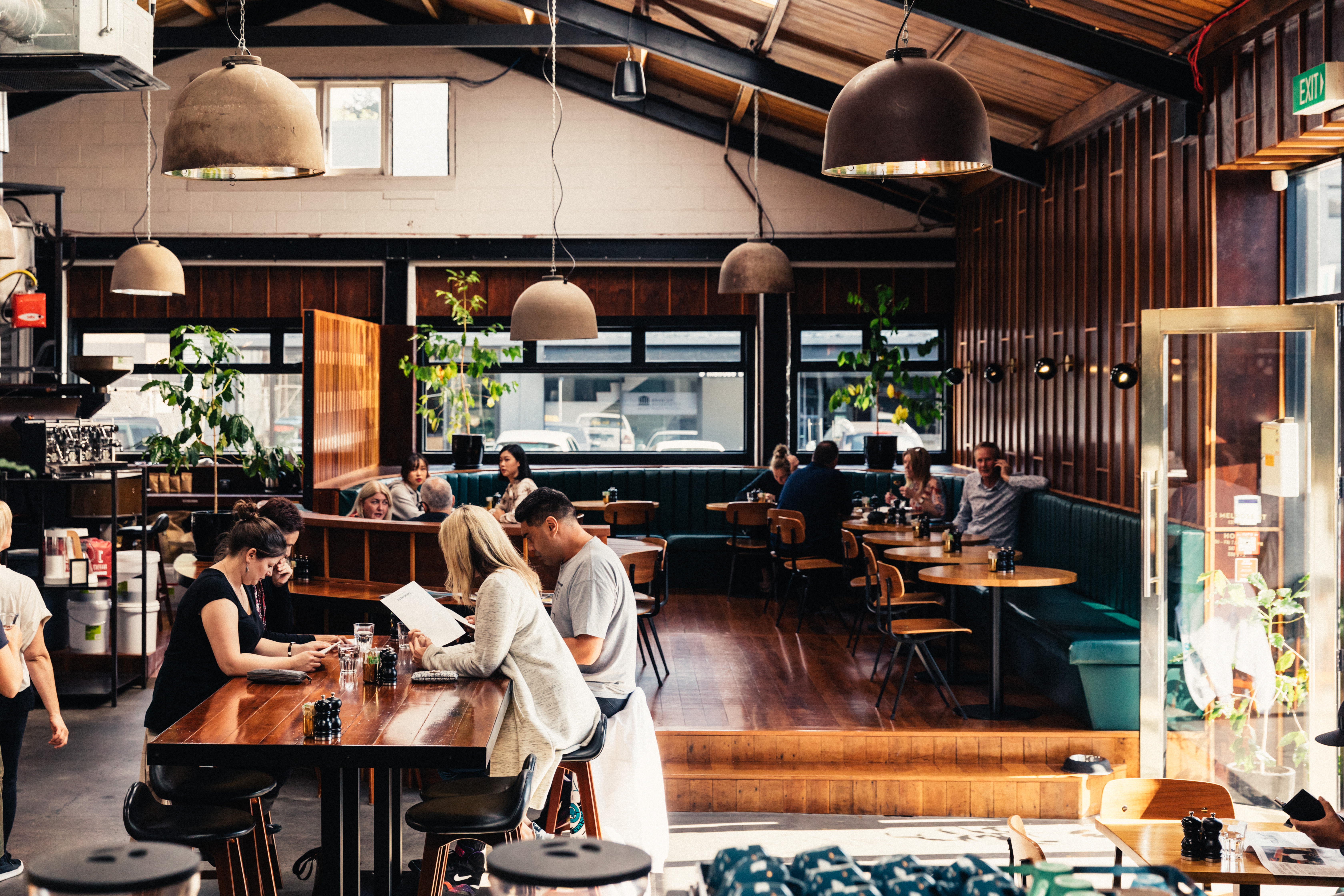 people reading menus at l'affare newmarket
