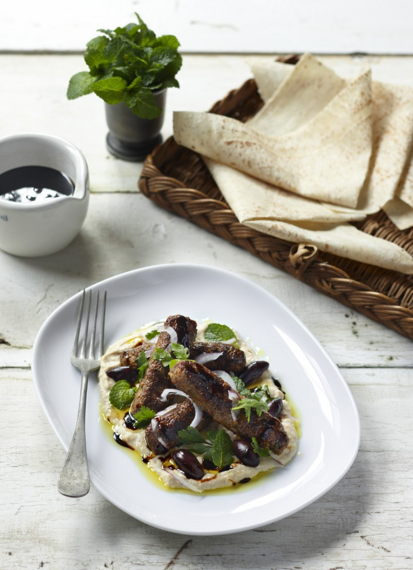 Spicy Lamb Sausages with White Bean Hummus